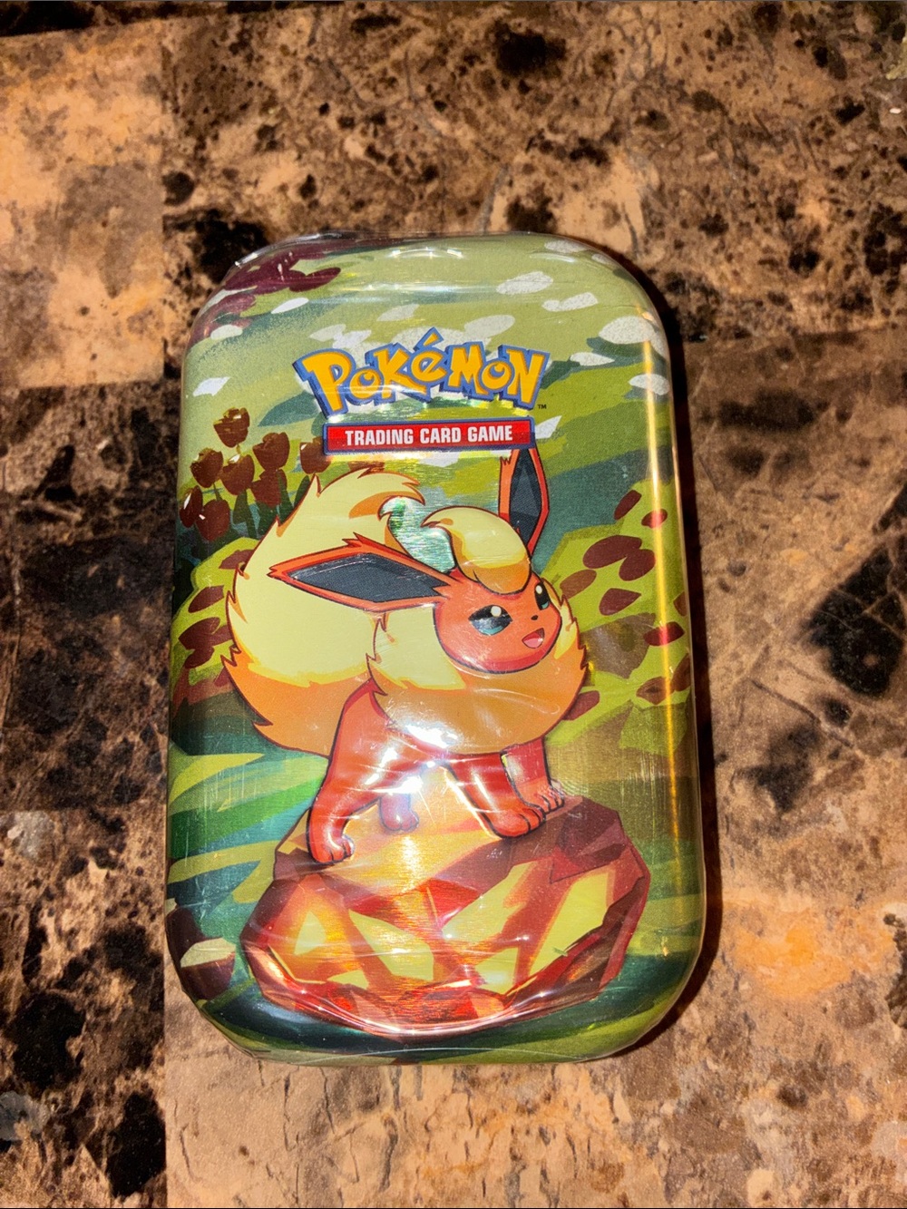 Pokemon Flareon Tin - Green, Yellow, Orange